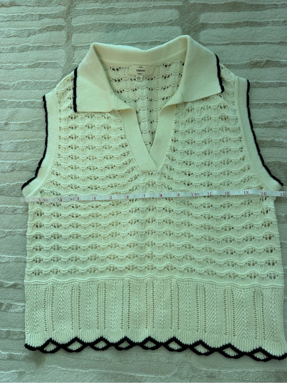 entro Cream V-Neck Sleeveless Eyelet Sweater with Black Trim